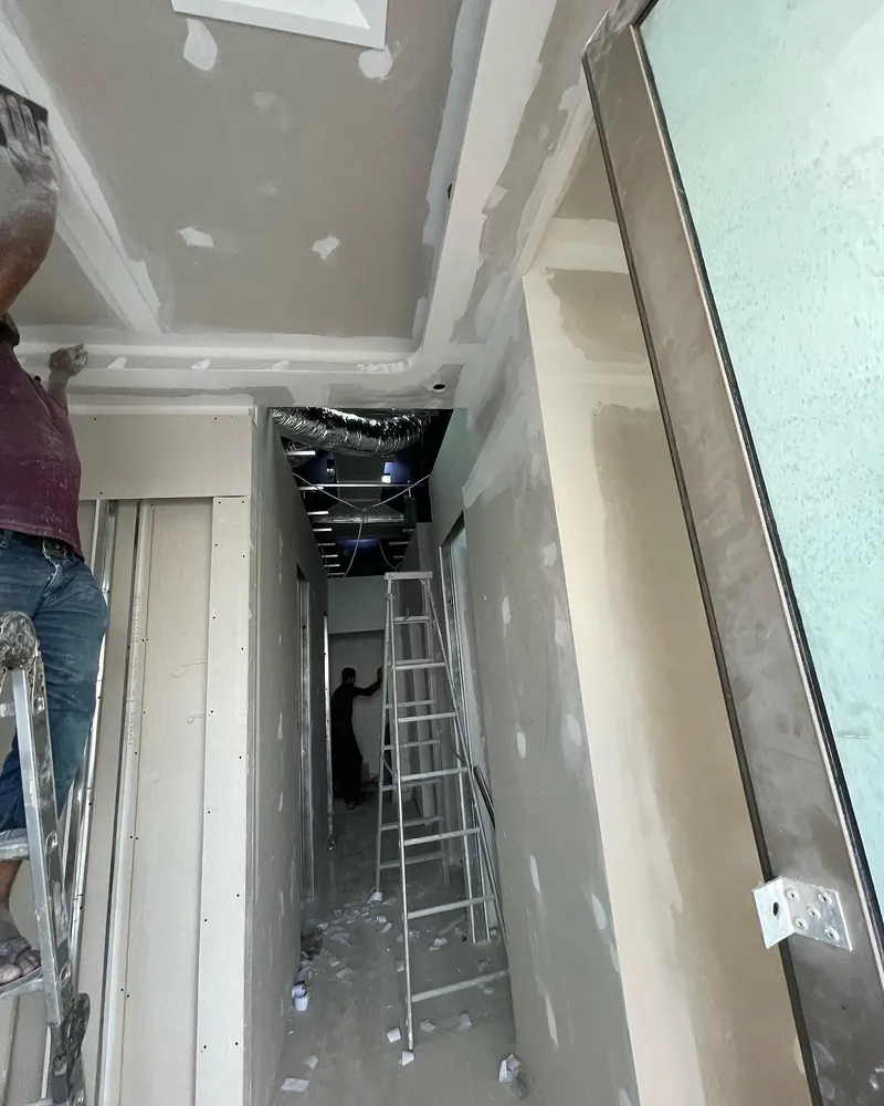 Gypsum partitions and ceiling — International City