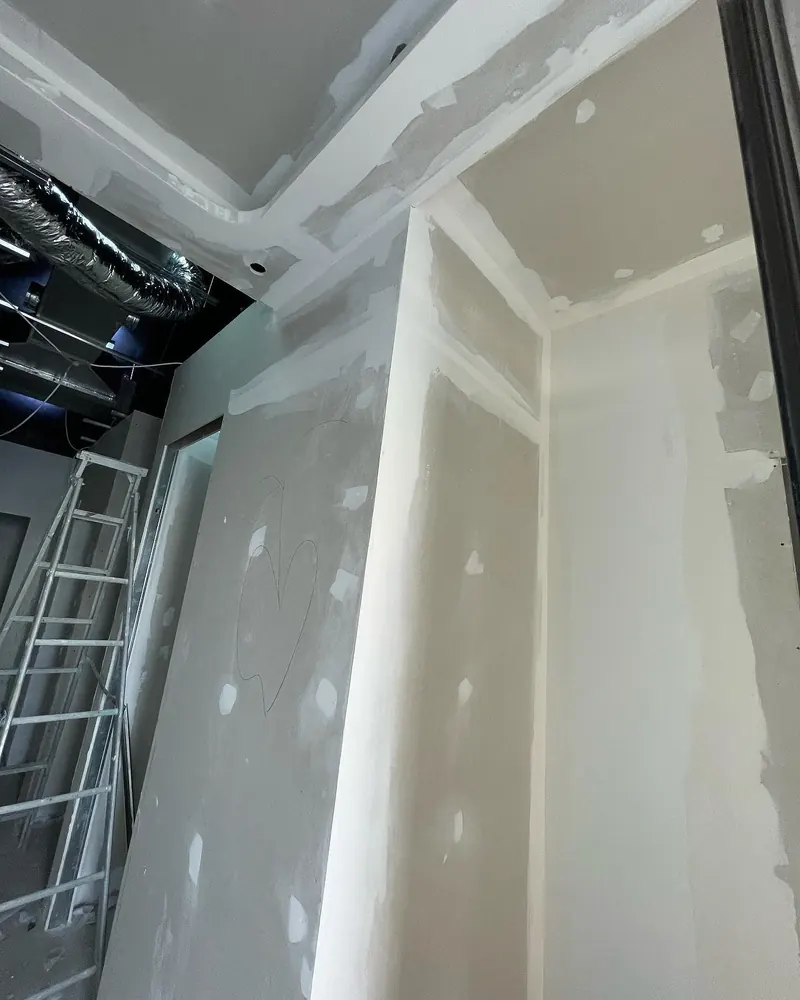 Gypsum partitions and ceiling — International City — detail