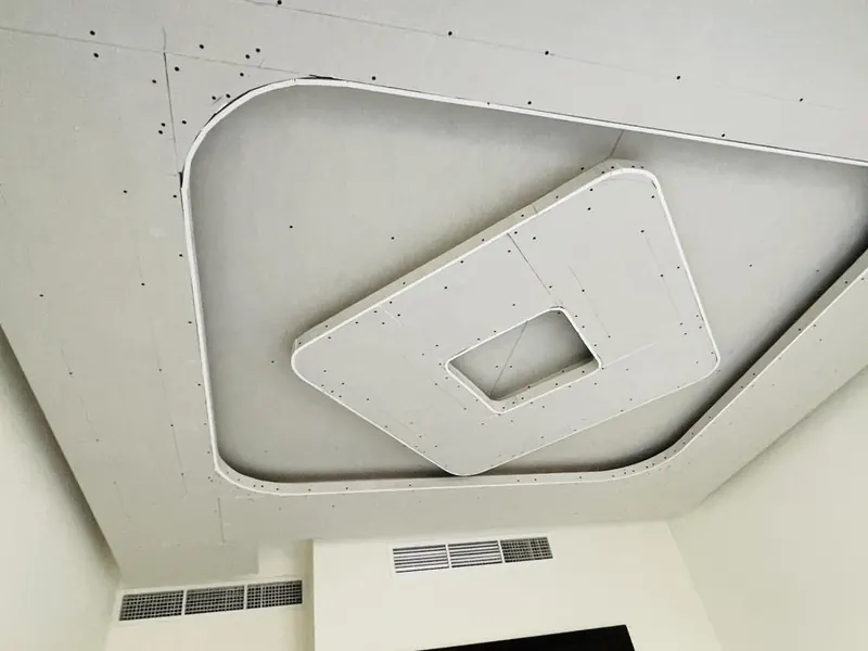 Curved gypsum ceiling feature, before finishing — detail