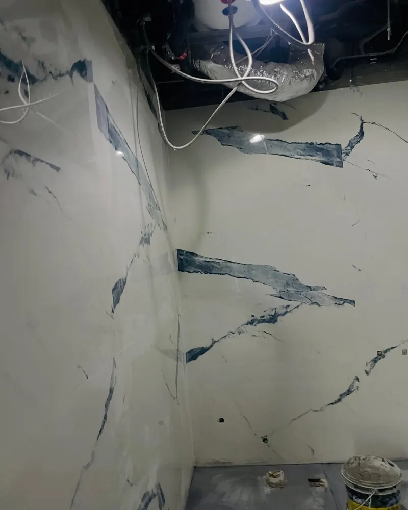 Marble-effect tiling, bathroom in progress — detail