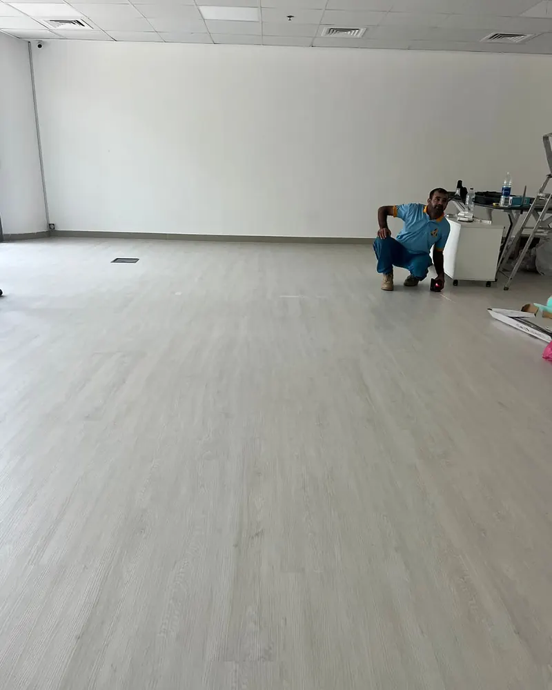 SPC flooring installation, empty unit