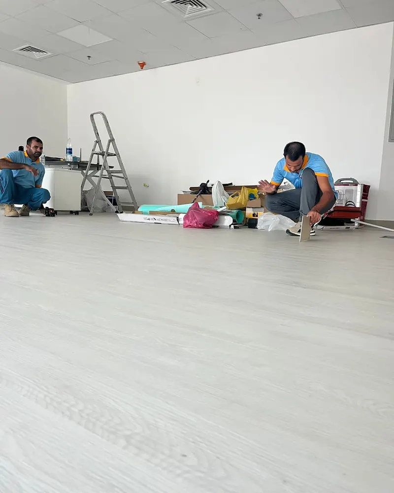 SPC flooring installation, empty unit — detail