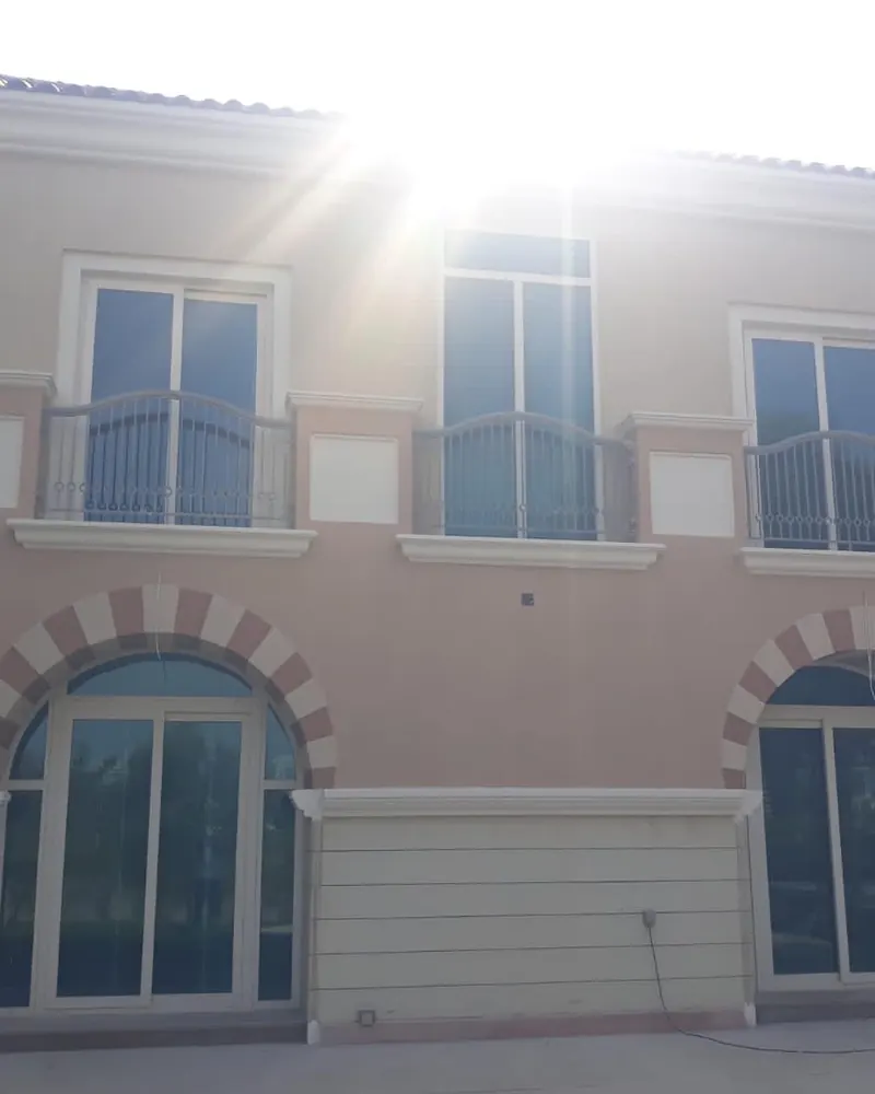 Villa exterior painting — Dubai Sports City — detail