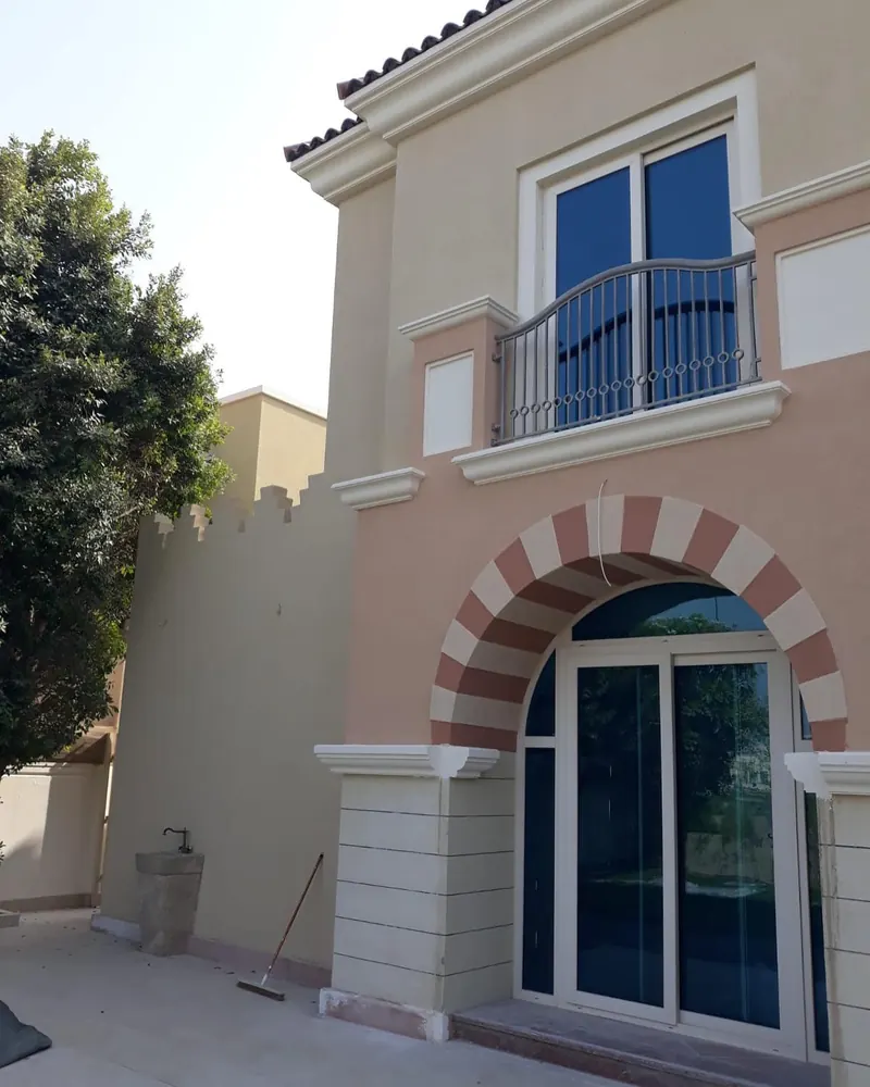 Villa exterior painting — Dubai Sports City — detail