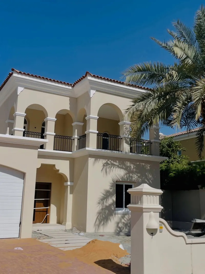 Villa exterior being painted, Victory Heights